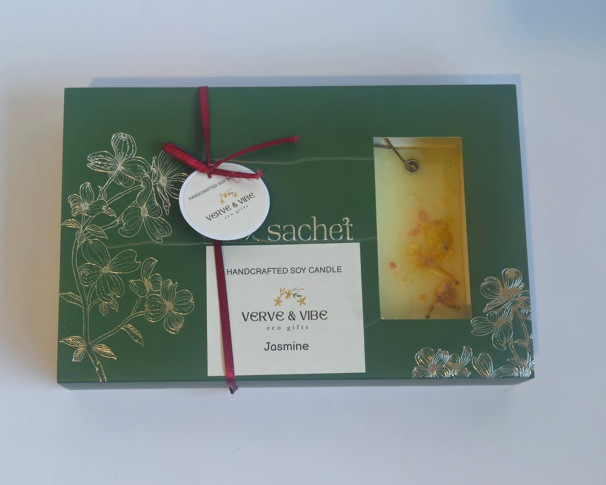 Green box with a clock design on a white surface