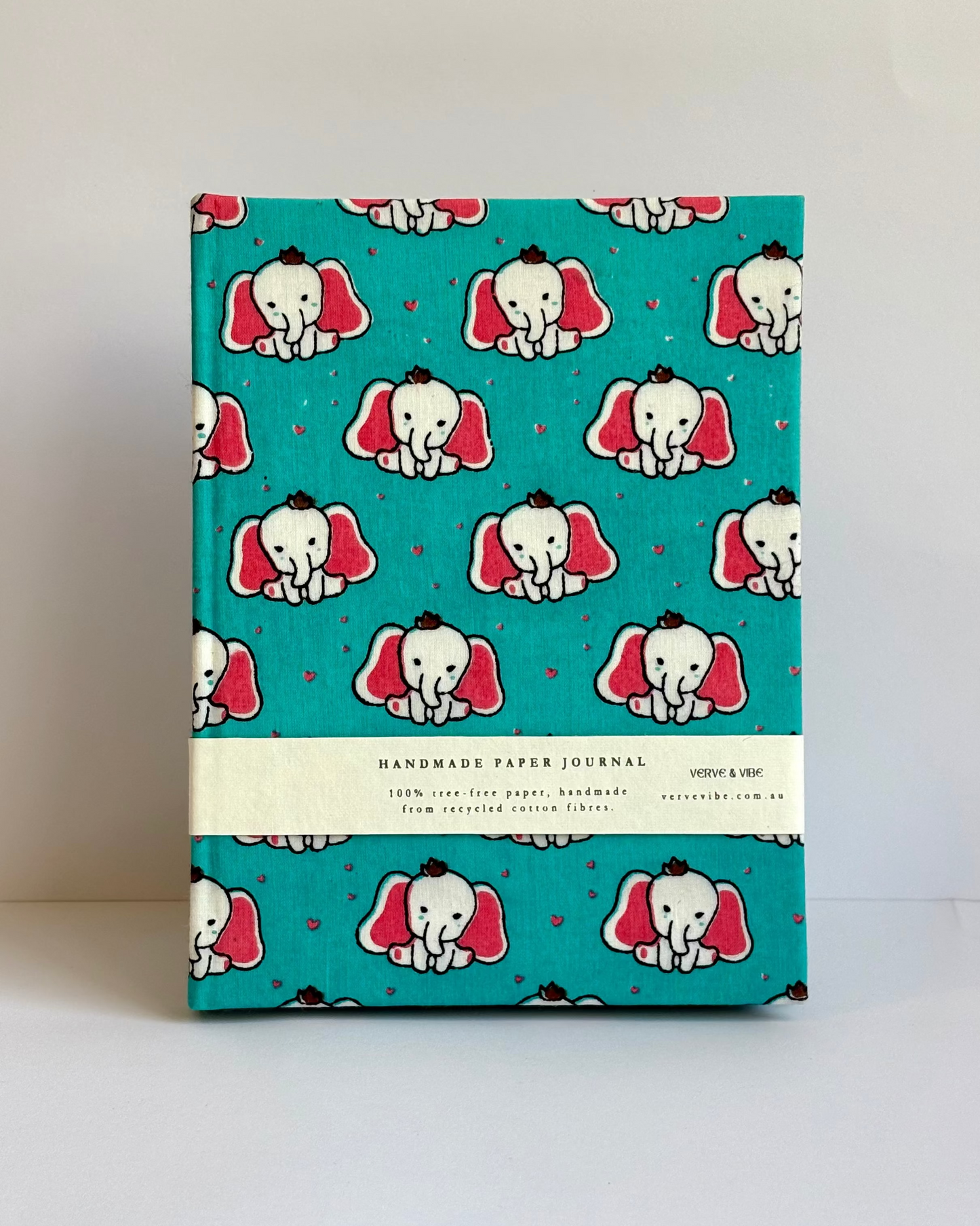 Journal with elephant pattern on a teal background