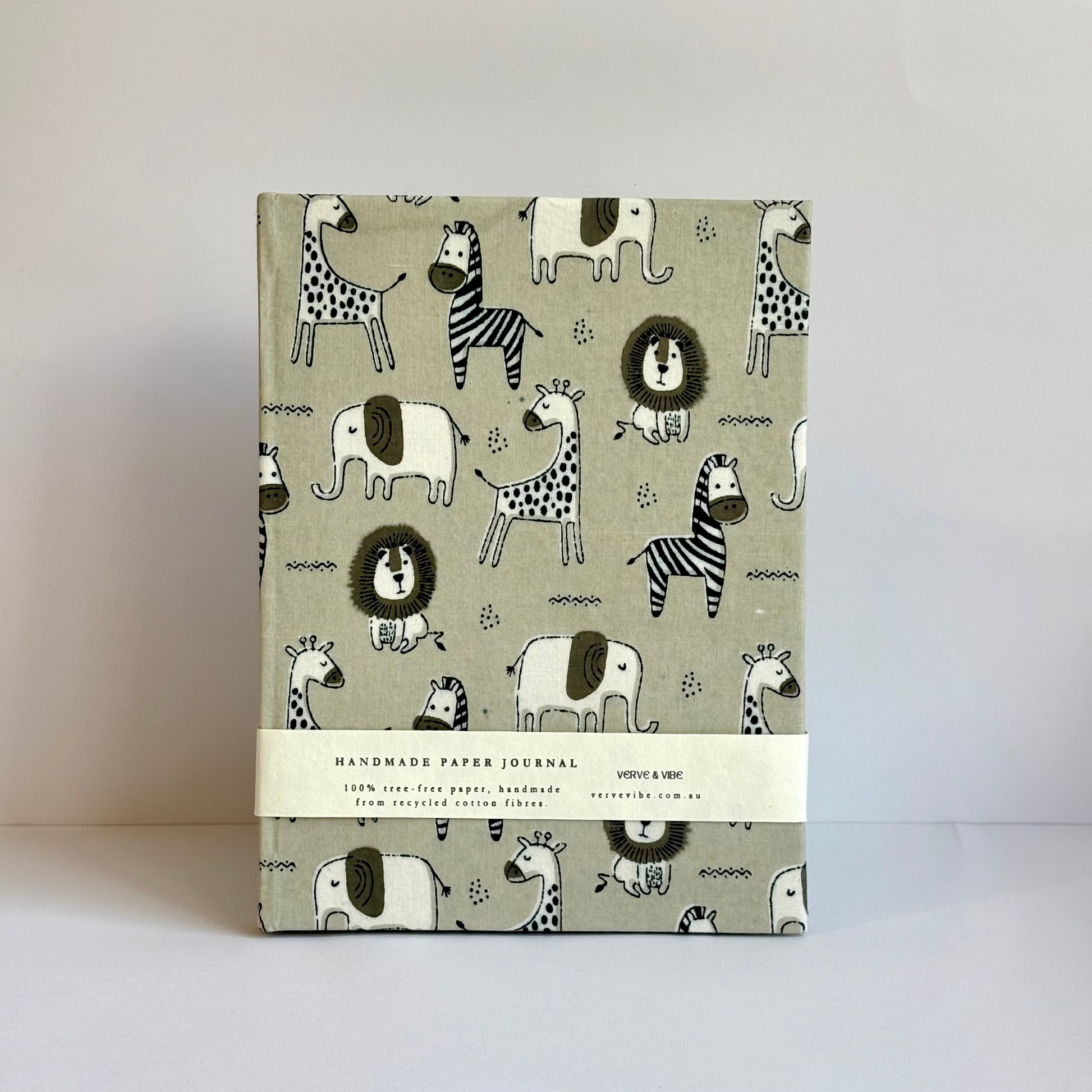 Handmade paper journal with animal pattern on a light gray background