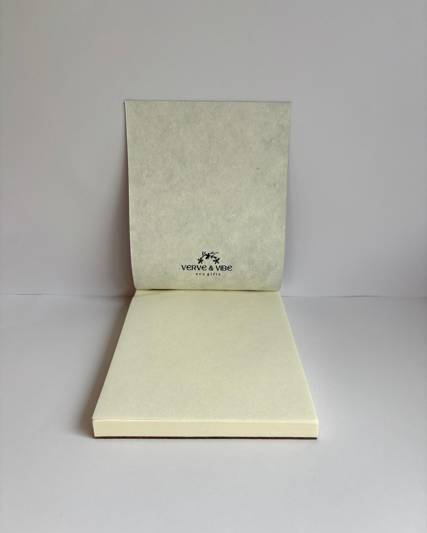 Open beige card with a logo on a white background