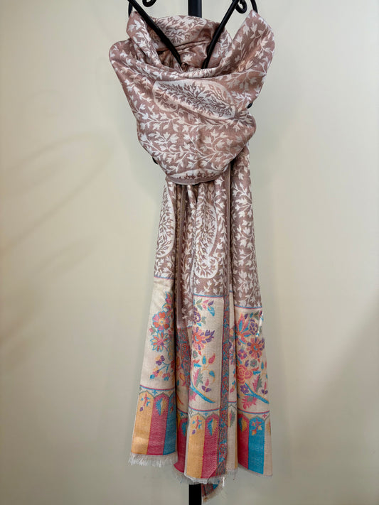 Decorative scarf with floral patterns on a plain background